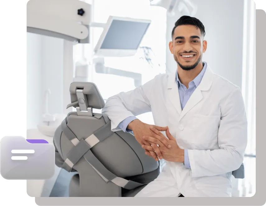 Smiling dental professional in a clinic chair.