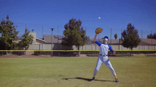 Baseball player tries to catch ball but the ball shifts
