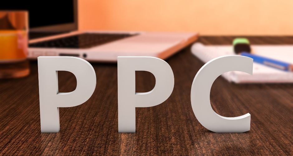 the letters ppc on a desk