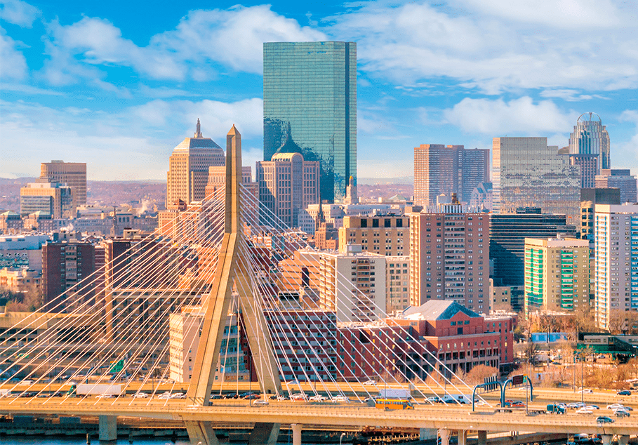 Boston skyline with a bridge over the river offers breathtaking views of the cityscape and waterway.