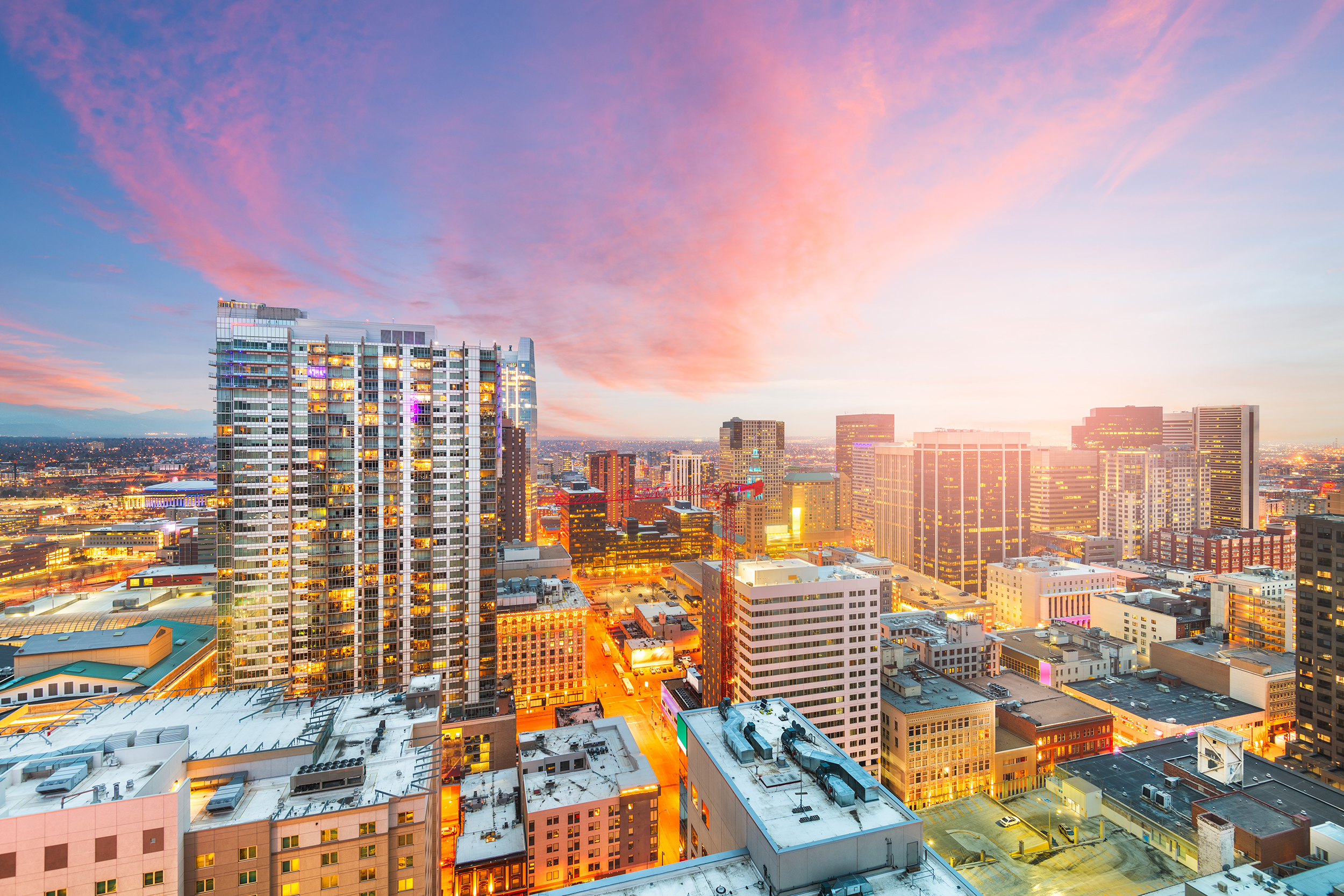 Experience the breathtaking cityscape of Denver at sunset.