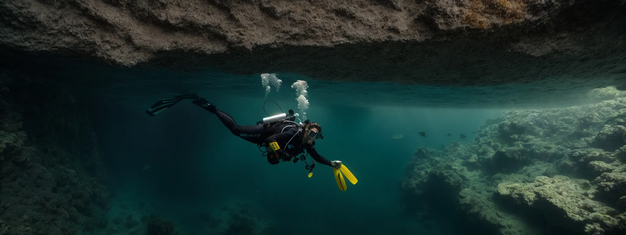 a diver exploring a transparent underwater cave system, symbolizing the thorough examination of website indexation.
