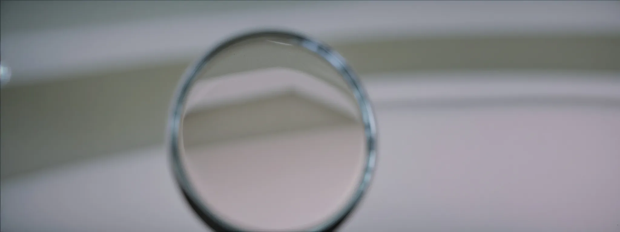 a close-up of a magnifying glass focusing on a webpage as a metaphor for seo indexing processes.
