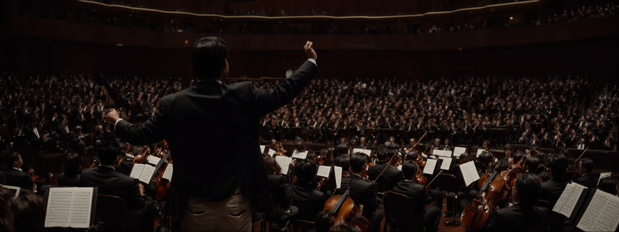 a conductor stands poised before an orchestra, arms aloft, ready to direct a harmonious performance.